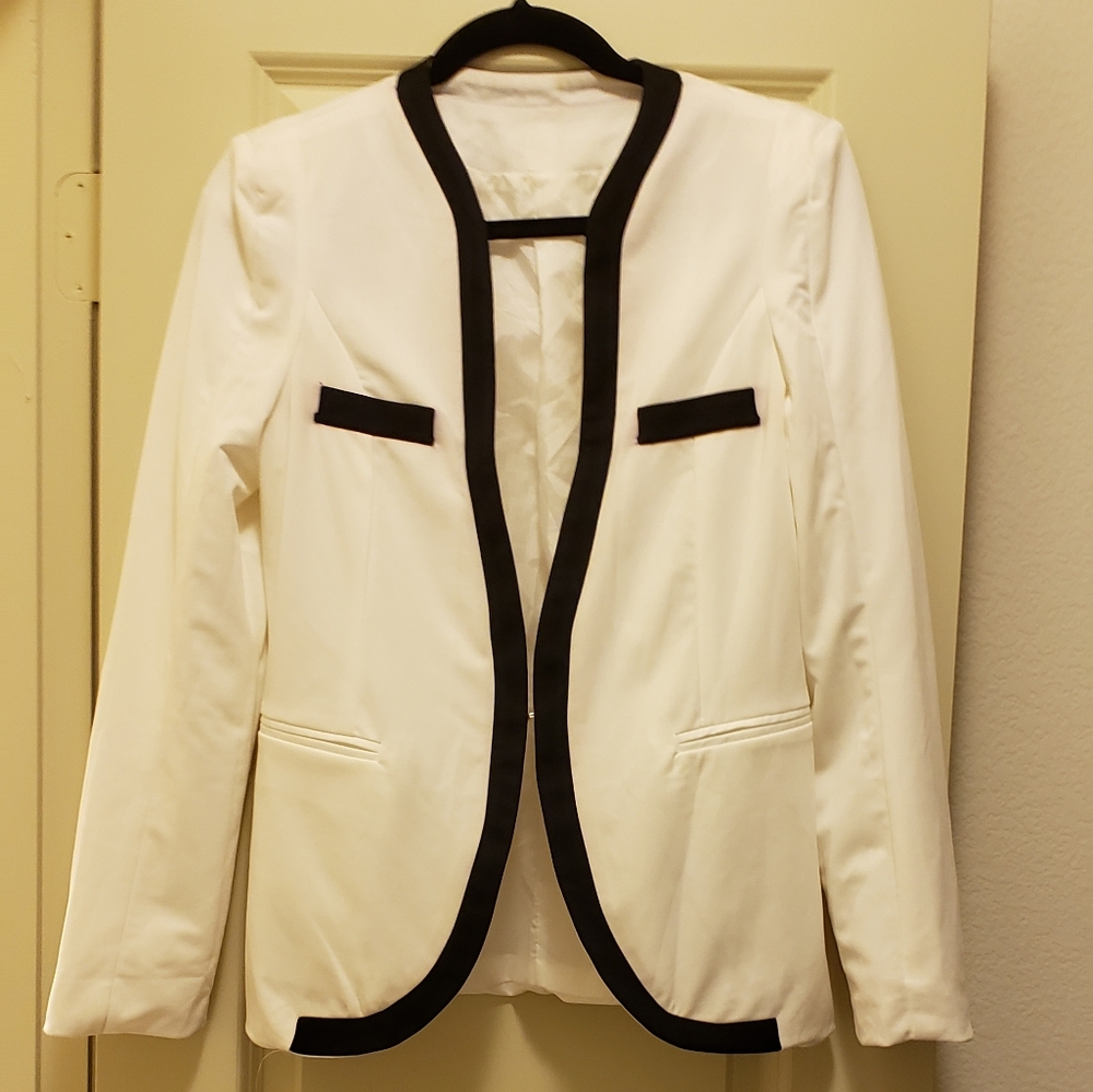 White blazer by egyptian designer
